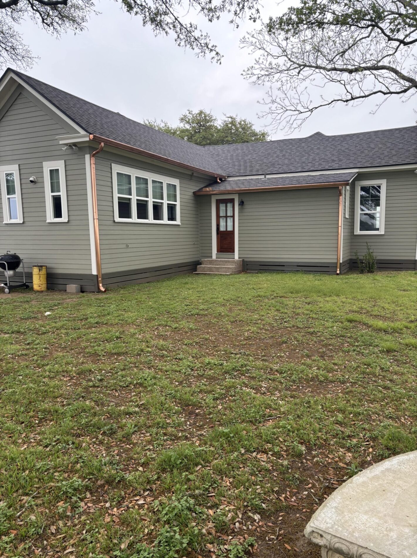 Colonial Grey gutters front
