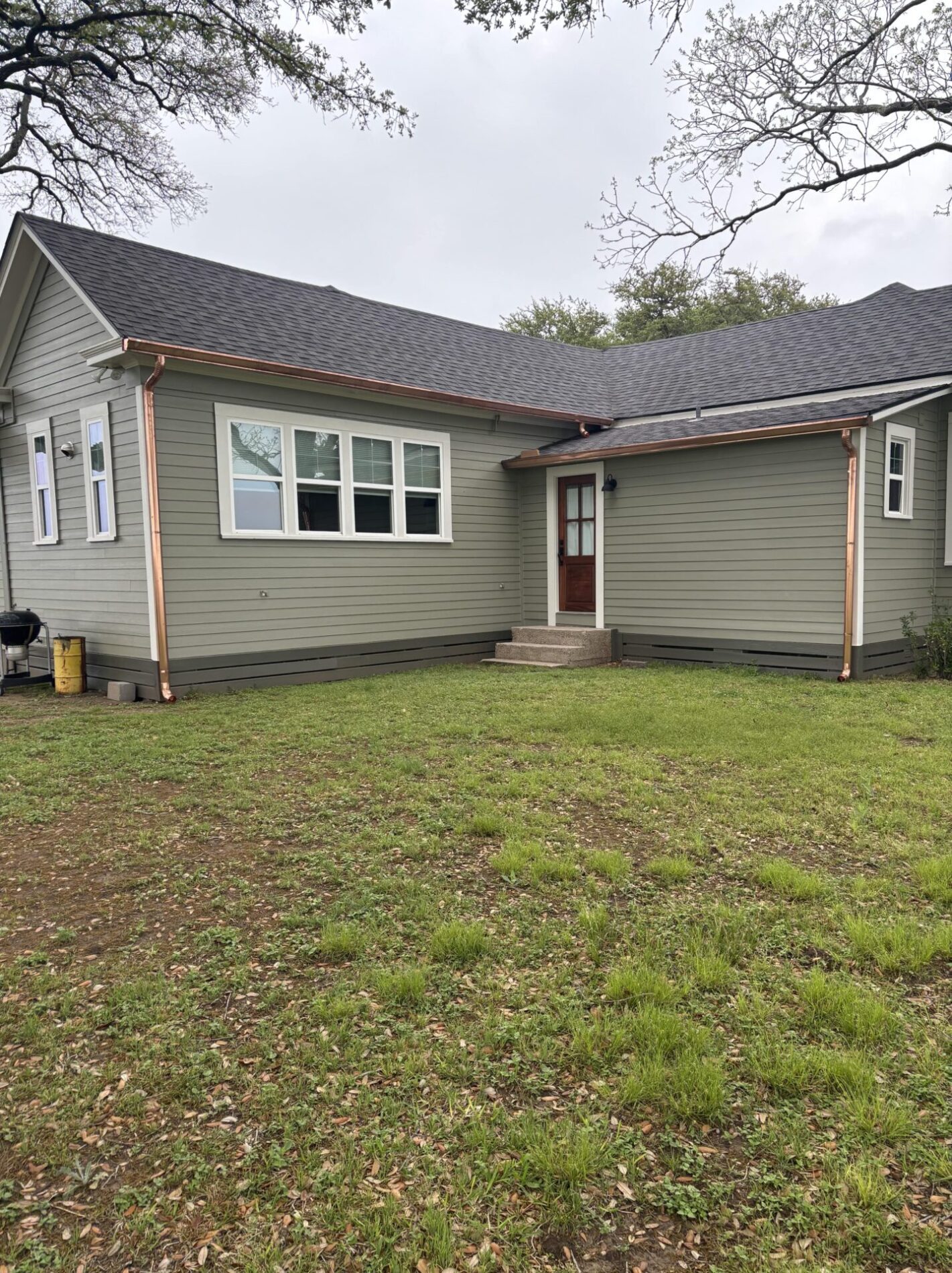 Colonial Grey gutters front
