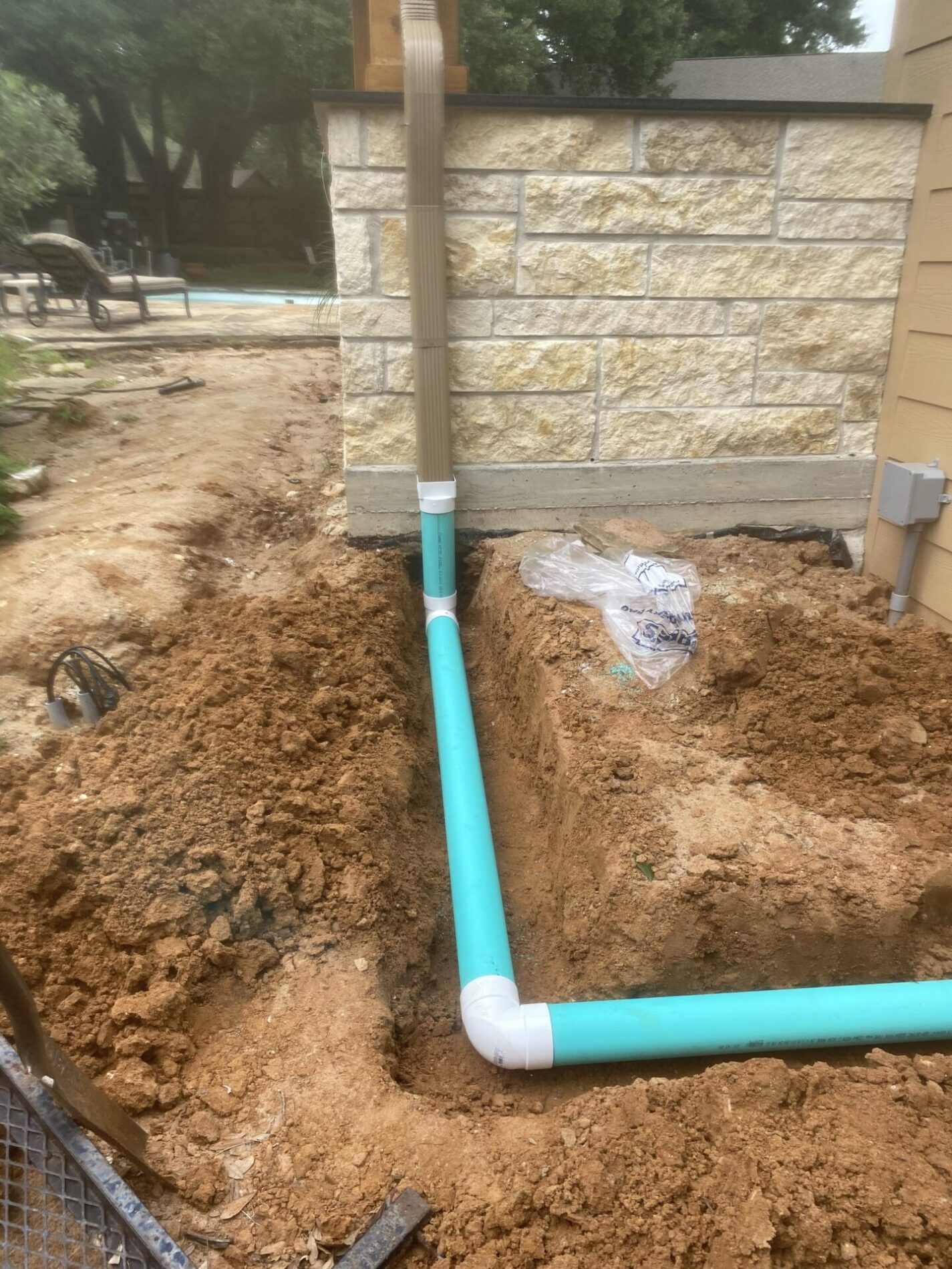 Dark Bronze tied into underground drainage